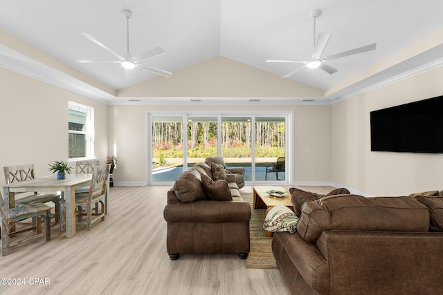 living room with lofted ceiling, baseboards, light wood finished floors, and ceiling fan