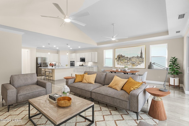 living room with visible vents, recessed lighting, and ceiling fan