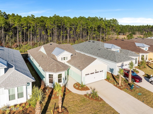 bird's eye view featuring a view of trees