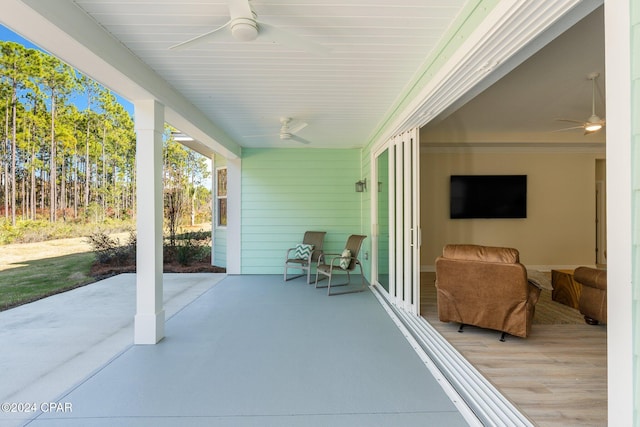 view of patio / terrace featuring ceiling fan