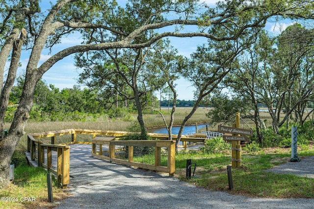 view of home's community featuring a water view