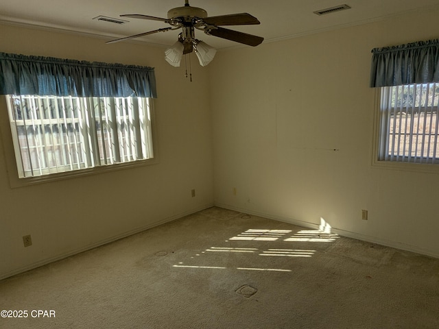 unfurnished room featuring carpet and ceiling fan