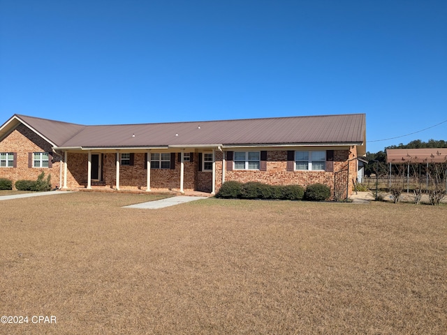 ranch-style house with a front yard