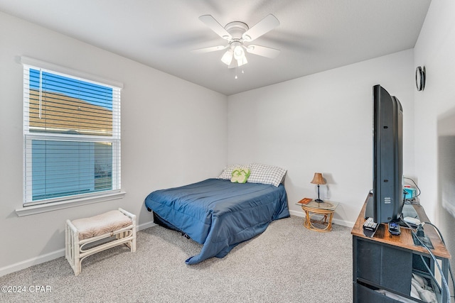 bedroom featuring ceiling fan and carpet floors