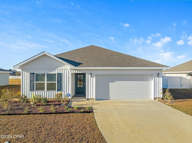 ranch-style house featuring a garage