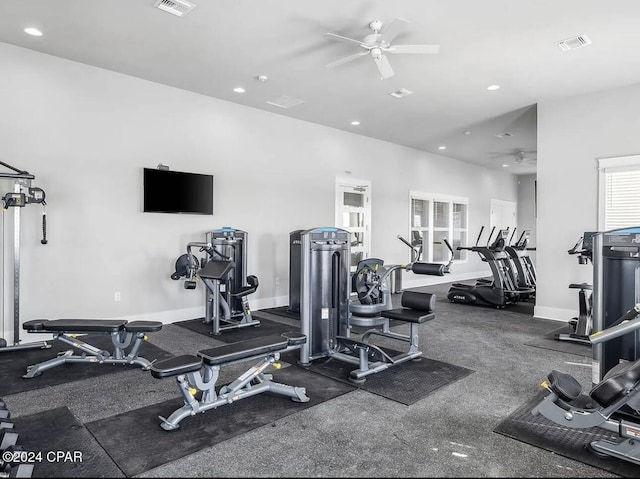 exercise room with ceiling fan