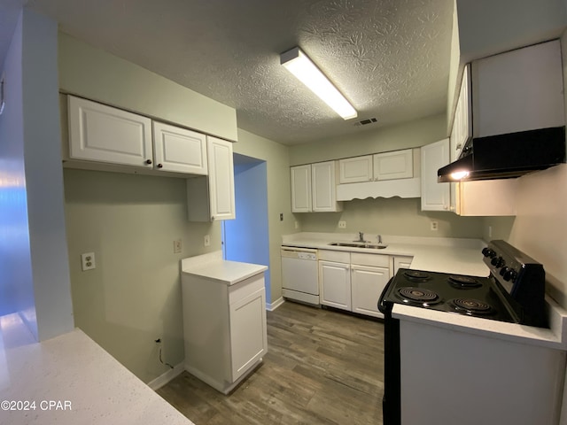 kitchen with electric range, dishwasher, and white cabinets