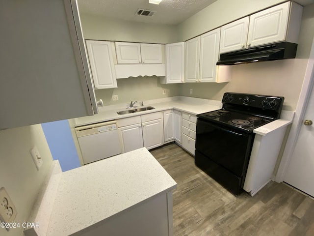 kitchen featuring electric range, sink, dark hardwood / wood-style flooring, white dishwasher, and white cabinets