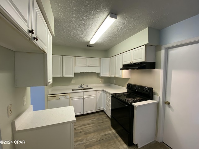 kitchen with white dishwasher, white cabinetry, sink, and black range with electric cooktop