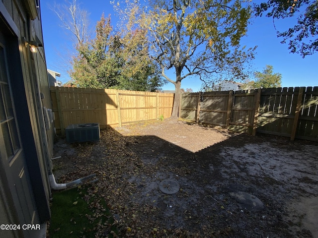 view of yard featuring central AC