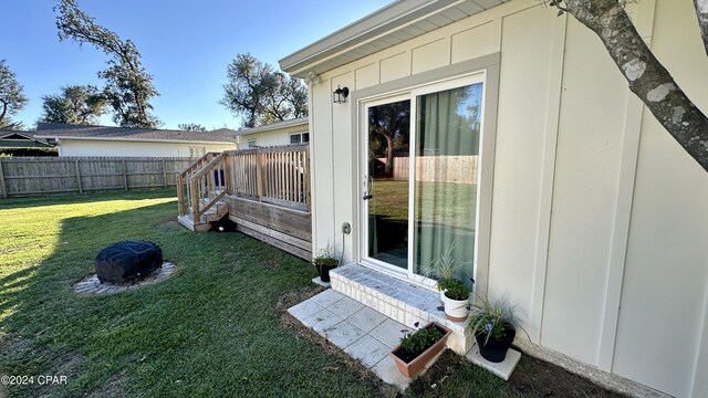 view of yard featuring a wooden deck