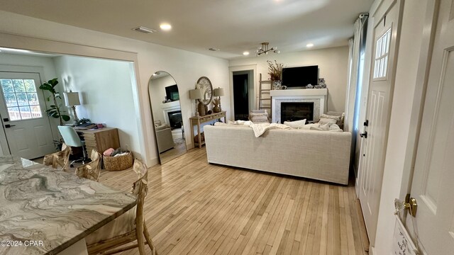 living room with light hardwood / wood-style floors