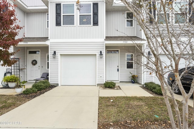 view of property with a garage