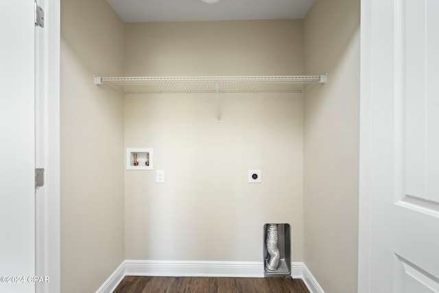 washroom featuring washer hookup, electric dryer hookup, and dark hardwood / wood-style floors