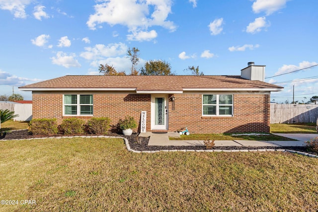 ranch-style house with a front yard