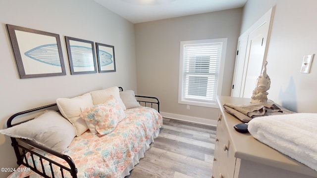 bedroom with light hardwood / wood-style floors