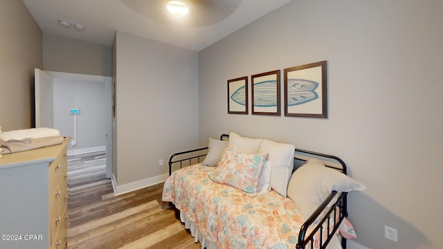 bedroom with light wood-type flooring