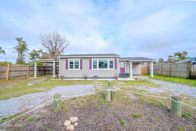 view of front of house with a carport