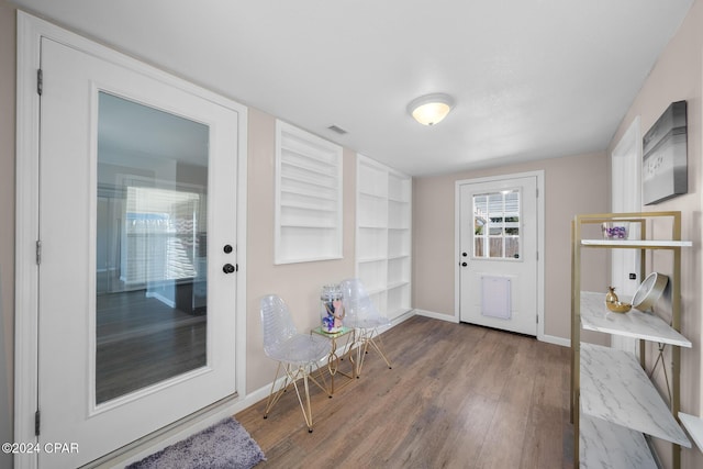 doorway to outside with hardwood / wood-style flooring