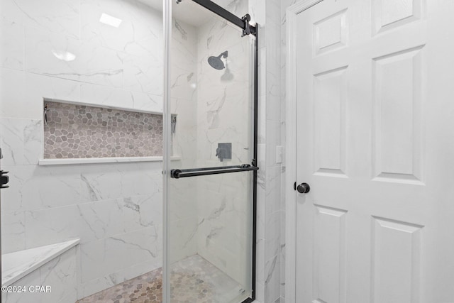 bathroom featuring walk in shower