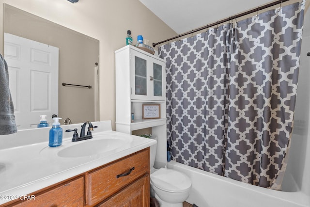 full bathroom featuring vanity, toilet, and shower / tub combo