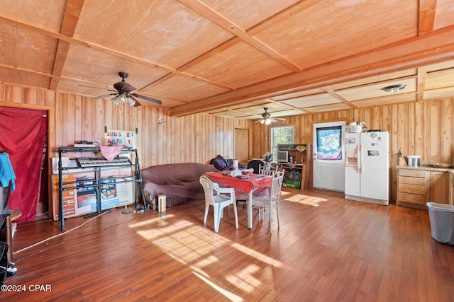 dining space featuring hardwood / wood-style flooring and ceiling fan