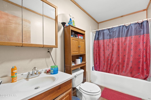 full bathroom with crown molding, vanity, shower / bath combination with curtain, and toilet