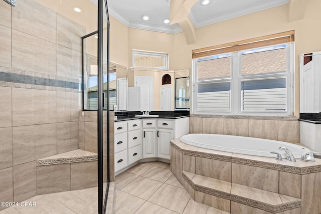 bathroom featuring tile patterned floors, crown molding, vanity, and plus walk in shower