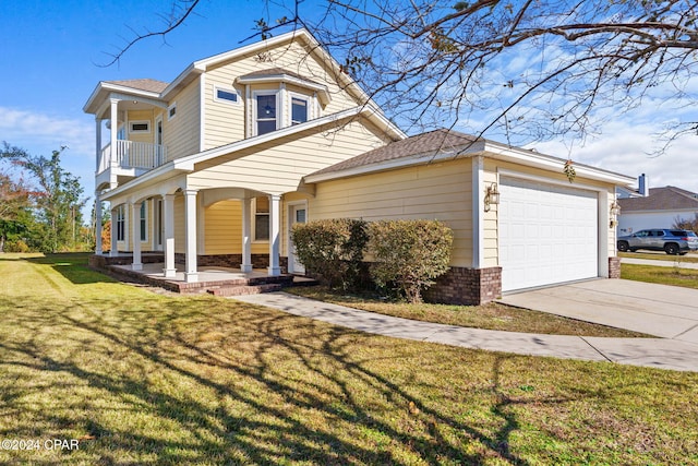 view of front of home featuring a front lawn, a porch, a balcony, and a garage