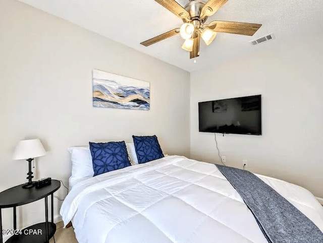 bedroom featuring ceiling fan