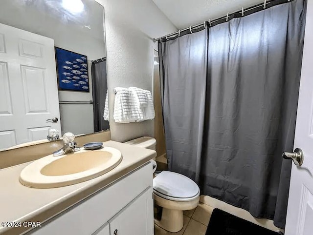 bathroom with tile patterned floors, vanity, toilet, and a shower with shower curtain