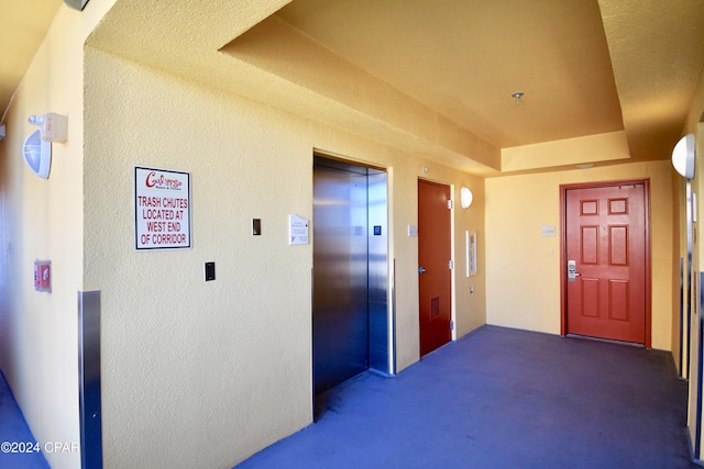 hallway featuring elevator