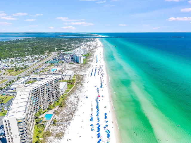 bird's eye view with a beach view and a water view