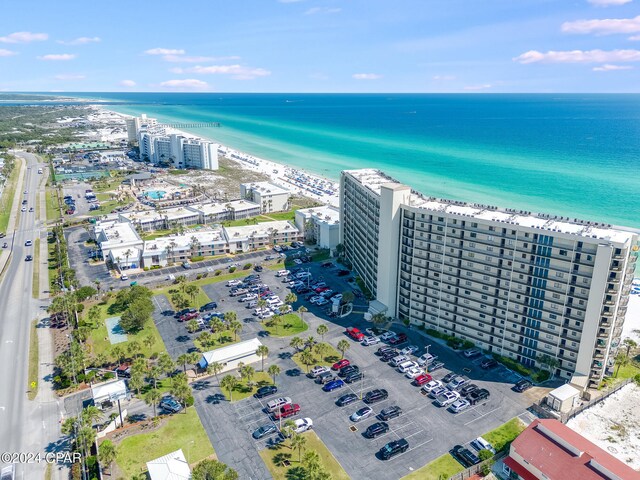 aerial view featuring a water view and a view of the beach