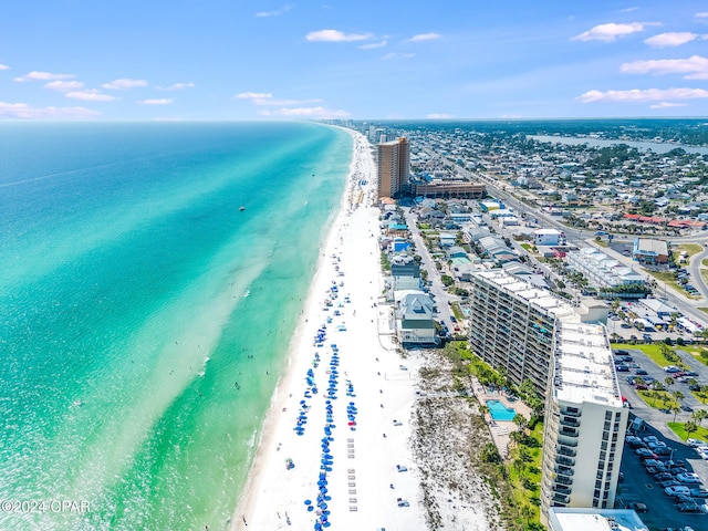 aerial view with a view of the beach and a water view