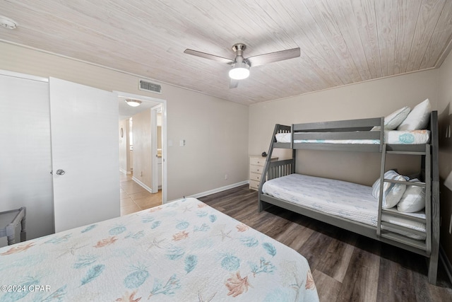 bedroom with ceiling fan, hardwood / wood-style floors, and wood ceiling