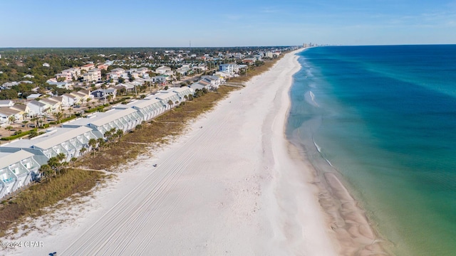 aerial view with a beach view and a water view