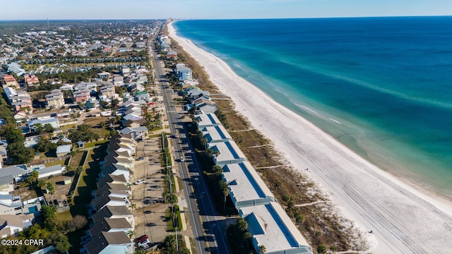 bird's eye view featuring a water view and a view of the beach