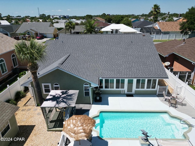 view of swimming pool with a patio area