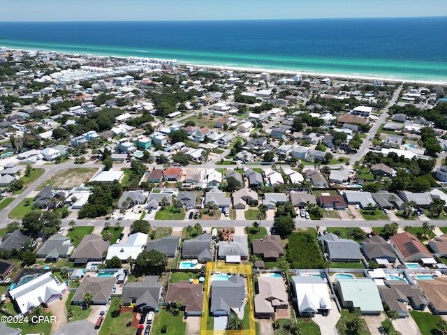 aerial view featuring a view of the beach and a water view