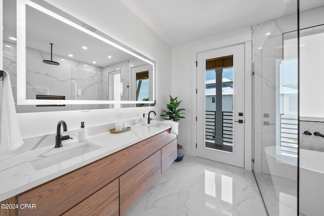 bathroom featuring a tile shower and vanity