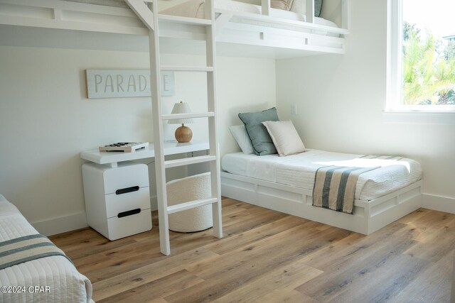 bedroom with light hardwood / wood-style flooring