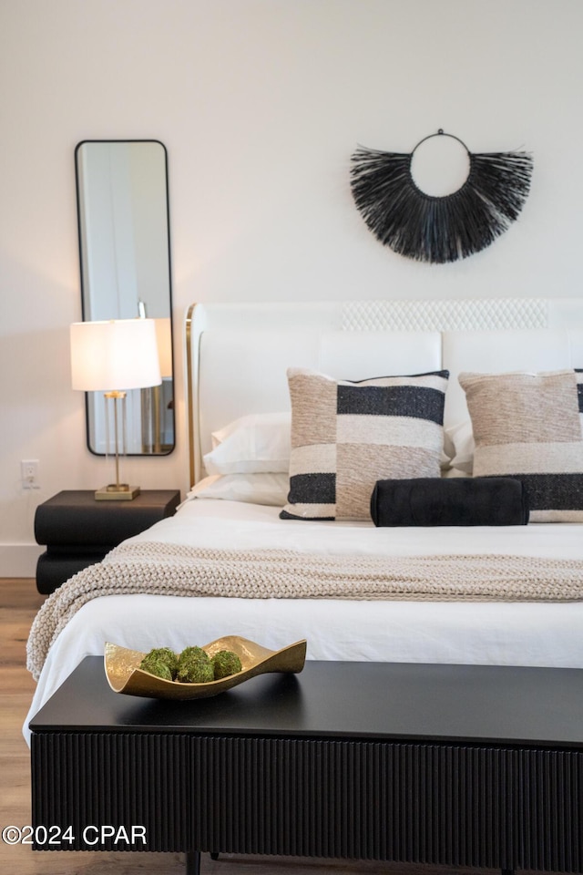 bedroom featuring hardwood / wood-style flooring