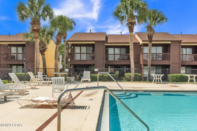 view of pool featuring a patio