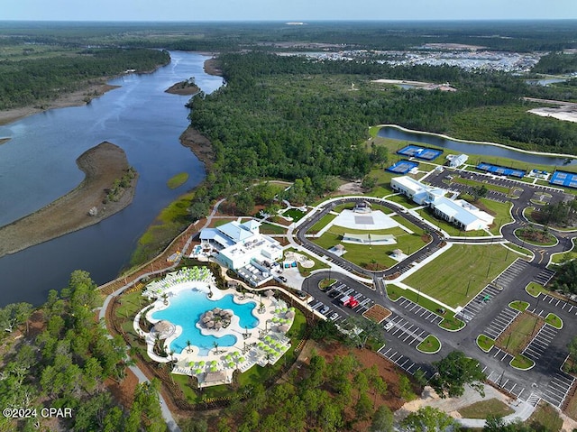 birds eye view of property with a water view