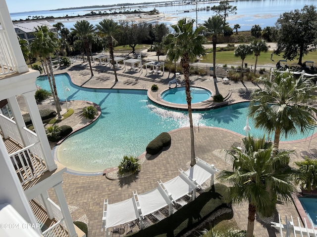 view of swimming pool featuring a patio