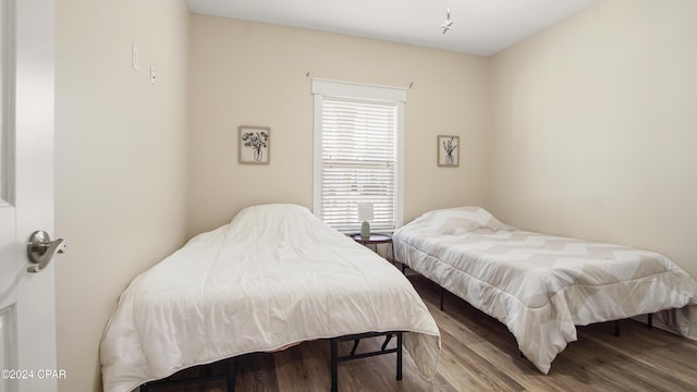 bedroom featuring hardwood / wood-style flooring