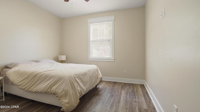 bedroom featuring hardwood / wood-style flooring and ceiling fan