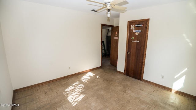 spare room featuring ceiling fan