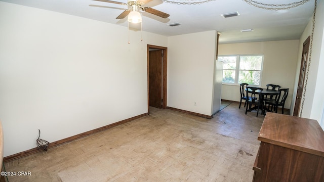 empty room featuring ceiling fan